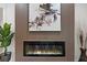 Modern fireplace with sleek design with hardwood accent wall at 1643 Flintwood Se Dr, Atlanta, GA 30316