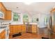 Bright eat-in kitchen with wood floors, stainless steel appliances, and plenty of natural light at 200 Ridge Bluff Ln, Suwanee, GA 30024