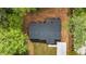 Overhead view of the dark roof, landscaping and a newly paved driveway at 2798 Hutchins Rd, Lawrenceville, GA 30044
