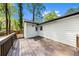 The backyard featuring a wooden deck at 2798 Hutchins Rd, Lawrenceville, GA 30044
