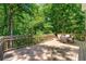 Large backyard deck offers ample space for outdoor entertaining and relaxation at 4150 Kalb Sw Ct, Smyrna, GA 30082