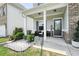 Inviting front porch with seating area, decorative landscaping, and a clear view of the home's address at 5322 Burrus Sw Ln, Mableton, GA 30126