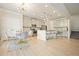 Modern kitchen featuring stainless steel appliances, granite countertops, and an open layout with a dining area at 5322 Burrus Sw Ln, Mableton, GA 30126