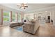 Open floor plan showcasing living area, fireplace, and eat-in kitchen at 5322 Burrus Sw Ln, Mableton, GA 30126