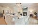 Comfortable living room with a fireplace, and an oversized sectional sofa at 5322 Burrus Sw Ln, Mableton, GA 30126