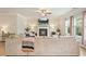Inviting living room featuring a fireplace, and a large sectional sofa at 5322 Burrus Sw Ln, Mableton, GA 30126