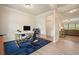 Functional home office space with a modern desk and comfortable seating at 5322 Burrus Sw Ln, Mableton, GA 30126