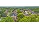Aerial view of the suburban homes surrounded by mature trees at 2321 Norbury Se Cv, Smyrna, GA 30080