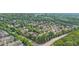 View of a neighborhood with mature tree coverage and winding roads at 2321 Norbury Se Cv, Smyrna, GA 30080