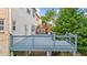 Enjoy outdoor living on the deck with views of the backyard and mature trees at 2321 Norbury Se Cv, Smyrna, GA 30080