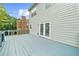A spacious back deck offers seamless indoor-outdoor living, enhanced by views of the landscaped yard at 2321 Norbury Se Cv, Smyrna, GA 30080