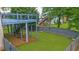 Backyard with a two-story deck, grassy area, and privacy fence at 2321 Norbury Se Cv, Smyrna, GA 30080