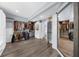 Spacious walk-in closet with multiple shelving units, clothing racks, and a full-length mirror to showcase organization at 2321 Norbury Se Cv, Smyrna, GA 30080