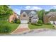 Charming two-story home with landscaped yard and a brick-lined driveway at 2321 Norbury Se Cv, Smyrna, GA 30080