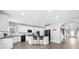 Bright kitchen with a large island, modern appliances, and white subway tile backsplash at 2321 Norbury Se Cv, Smyrna, GA 30080