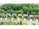 An aerial view highlights a well-maintained home in a beautiful neighborhood at 475 Bayswater Way, Suwanee, GA 30024