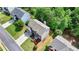 This aerial view shows the location of the home relative to surrounding trees at 475 Bayswater Way, Suwanee, GA 30024