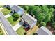 This aerial view shows the location of the home relative to other houses in the neighborhood at 475 Bayswater Way, Suwanee, GA 30024