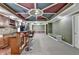 The finished basement features an entertaining space with a wet bar at 475 Bayswater Way, Suwanee, GA 30024