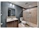 Bathroom with tiled shower, vanity, and modern fixtures at 475 Bayswater Way, Suwanee, GA 30024