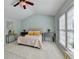 Bright bedroom with ample natural light, neutral colors and vaulted ceiling at 475 Bayswater Way, Suwanee, GA 30024