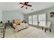 Bright bedroom with ample natural light, neutral colors and vaulted ceiling at 475 Bayswater Way, Suwanee, GA 30024