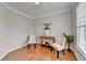Bright dining room with hardwood floors, natural light, and neutral paint at 475 Bayswater Way, Suwanee, GA 30024