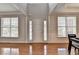 Bright foyer with gleaming hardwood floors, large windows, and a soaring ceiling at 475 Bayswater Way, Suwanee, GA 30024