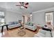Living room featuring hardwood floors and neutral paint at 475 Bayswater Way, Suwanee, GA 30024