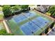 Well-maintained community tennis courts provide residents the opportunity to enjoy active recreation and social engagement at 475 Bayswater Way, Suwanee, GA 30024