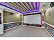 Home theater room features a large screen and decorative recessed ceiling at 475 Bayswater Way, Suwanee, GA 30024
