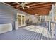 Spacious back deck featuring a fan and grill, perfect for entertaining at 130 Thornton Dr, Fayetteville, GA 30214
