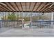 Back deck with view of pool and wooded backyard, perfect for entertaining at 130 Thornton Dr, Fayetteville, GA 30214