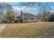 Well-maintained two-story home featuring a spacious front yard and classic colonial design at 130 Thornton Dr, Fayetteville, GA 30214