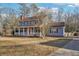Beautiful two-story home with a covered front porch, perfect for relaxing and enjoying the view at 130 Thornton Dr, Fayetteville, GA 30214