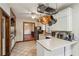 Cozy kitchen features custom brick accents, stainless appliances and tile floors at 130 Thornton Dr, Fayetteville, GA 30214
