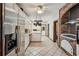 Spacious kitchen features stainless steel appliances and custom brick accent wall at 130 Thornton Dr, Fayetteville, GA 30214
