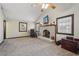 Inviting living room with a cozy fireplace and lots of natural light at 130 Thornton Dr, Fayetteville, GA 30214