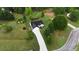 Aerial view of home with driveway and surrounding greenery at 210 Overview Ct, Villa Rica, GA 30180
