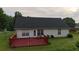 Backyard featuring a deck with views of the surrounding yard at 210 Overview Ct, Villa Rica, GA 30180