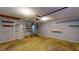 Empty garage area, features shelving and access to the outside at 210 Overview Ct, Villa Rica, GA 30180