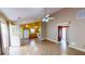 Open-concept living room with tile floors seamlessly connects to the modern kitchen for easy entertaining at 210 Overview Ct, Villa Rica, GA 30180