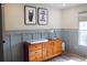 Well-lit Bedroom with a dresser, changing table and stylish decor at 2193 Kildare Nw Way, Kennesaw, GA 30152