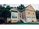 Charming two-story home features a two car garage, stairs to the front door, and a well-manicured lawn at 2193 Kildare Nw Way, Kennesaw, GA 30152