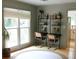 Bright home office with two workstations, large window, decor, and neutral paint perfect for productivity at 2193 Kildare Nw Way, Kennesaw, GA 30152