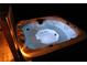 Hot tub with blue lighting creating a relaxing experience at 2193 Kildare Nw Way, Kennesaw, GA 30152