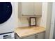 Compact laundry room with washer and dryer at 2193 Kildare Nw Way, Kennesaw, GA 30152