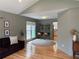 Open floor plan with built-in desks and chairs, neutral walls, and natural light great for entertaining at 2193 Kildare Nw Way, Kennesaw, GA 30152