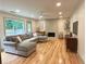 Spacious living room with fireplace and large windows at 2193 Kildare Nw Way, Kennesaw, GA 30152