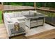 Cozy outdoor seating area with wicker furniture set and wooden deck, perfect for relaxation at 2193 Kildare Nw Way, Kennesaw, GA 30152